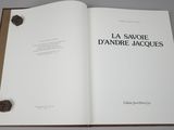 an open book with a black and white title on it