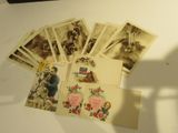 a lot of old postcards sitting on a table