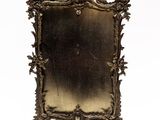an image of a mirror with a gold frame on a white background