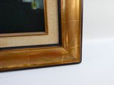 a picture of a picture of a vase of flowers in a gold frame