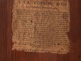 a sign on the door of a building that says al attoloso dio