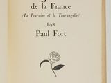 an open book with a drawing of a rose on it