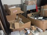 many boxes that are sitting on the floor next to each other