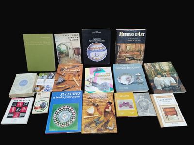 many books that are sitting on a table together