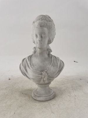 white marble bust of a woman with braids on her hair