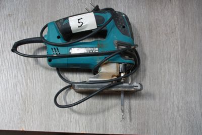 a small electric tool that is on a table