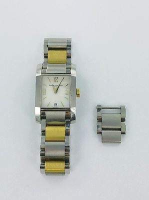 a silver and gold watch and a silver and gold bracelet