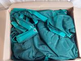 a box with a bunch of clothes inside of it