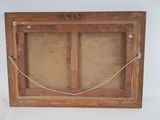an old picture frame with a rope hanging from it ' s side