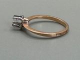 an image of a diamond ring on a table