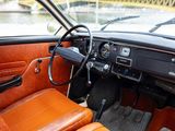 a car dashboard with a steering wheel and a dash board