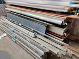 many different types of pipes and pipes stacked on top of each other