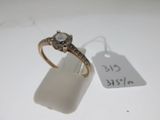 a ring with a diamond on it and a price tag