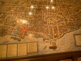 a map of a city on display in a museum