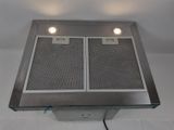 two lights that are on above a stove top