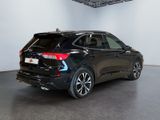 the rear end of a black 2020 ford edge