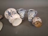 four vases that are sitting on a table