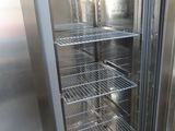 a refrigerator that has a lot of food inside of it