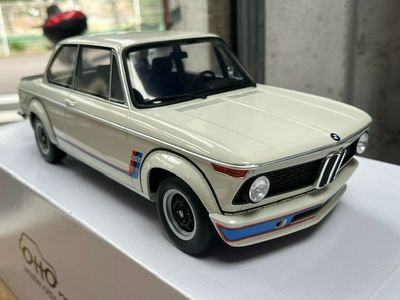 a toy car that is sitting on top of a box