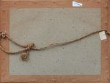 a picture of a rope wrapped around a piece of paper