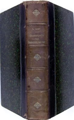 an old book opened to show the spines of a book