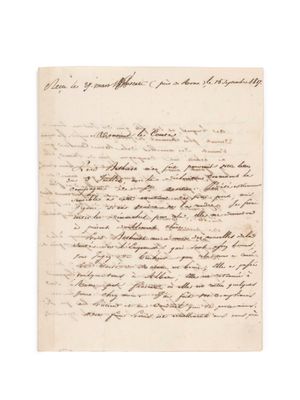 une lettre écrite à l'encre noire sur une feuille de papier