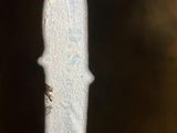 a close up of a knife on a table