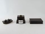 three different items that are sitting on a white surface