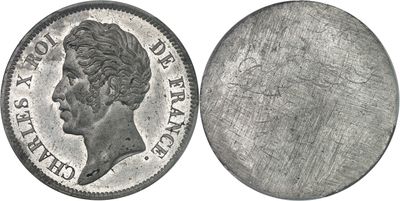 a close up of a coin on a white background
