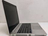 a laptop computer that is sitting on a table