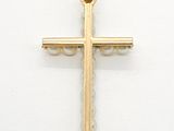 an image of a gold cross on a white background