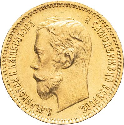 l'image d'une pièce d'or sur laquelle figure le visage d'un homme