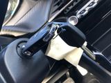 a close up of a car dashboard with a cell phone in it