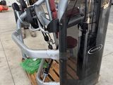 a gym machine that is on a pallet in a warehouse