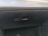 a car door handle that has a hole in it