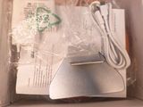 a box with a computer mouse and other items inside of it