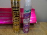 two different types of hair products on a table