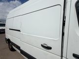 a white van that is parked in a parking lot