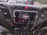 a picture of a car dashboard with a digital display