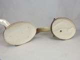 pair of antique white porcelain candlesticks with wooden handles