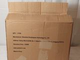 a cardboard box that is sitting on a white surface