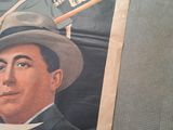 a picture of a man with a hat and a baseball bat