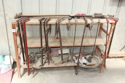 a shelf with a bunch of tools on top of it