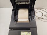 a printer that is sitting on top of a table