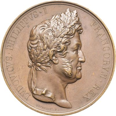 une image représentant une médaille de bronze sur laquelle figure la tête d'un homme