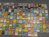 a lot of cards laid out on the floor