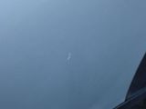 a close up of a car ' s front bumper with a dent on it