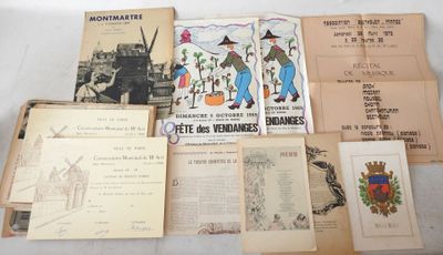 several old books are stacked on top of each other on a table