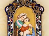 a picture of a picture of a woman holding a child