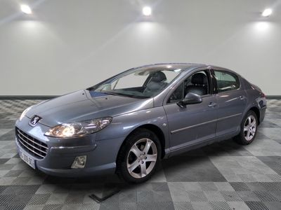 a picture of a car that is parked in a garage
